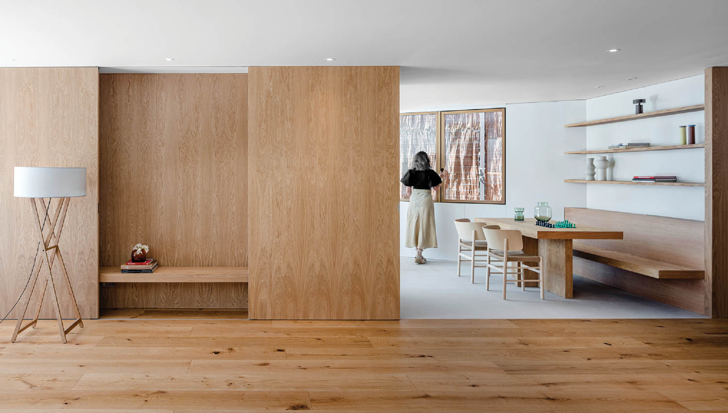 wooden partition separates dining room from living room