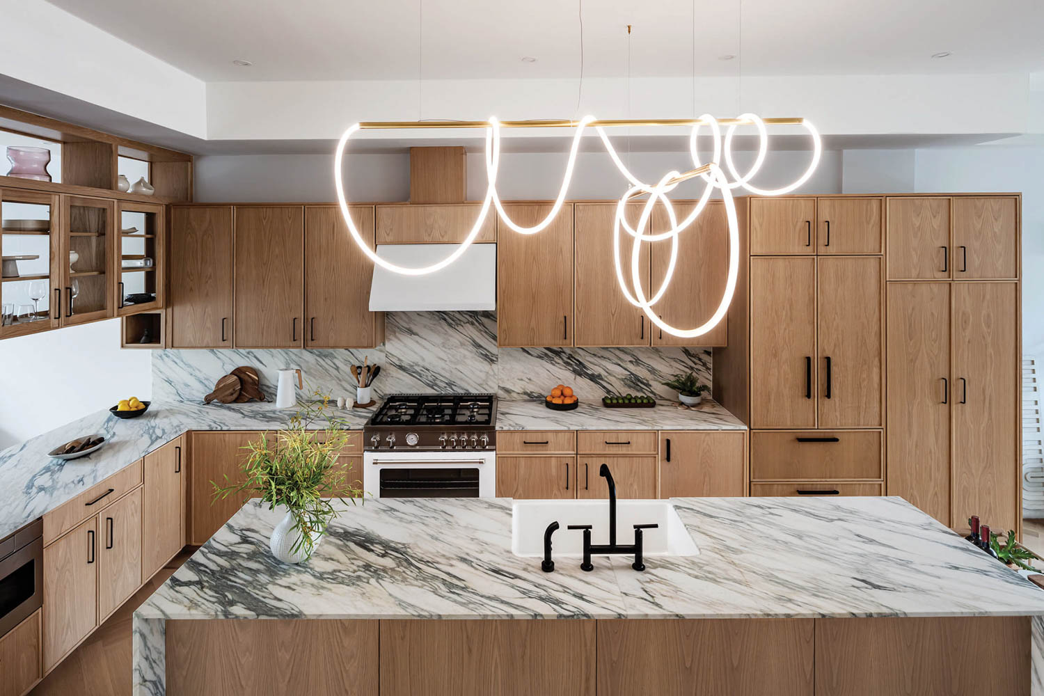 kitchen with all-white oak and marble countertops