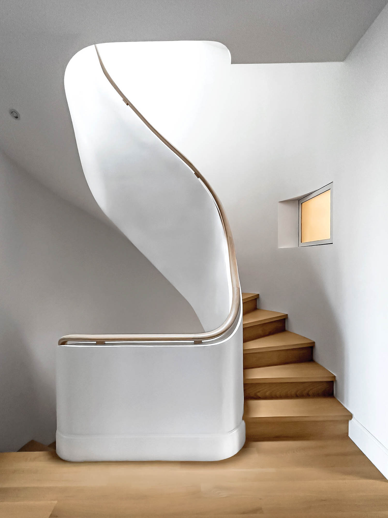 white stairway area with stairs in white oak