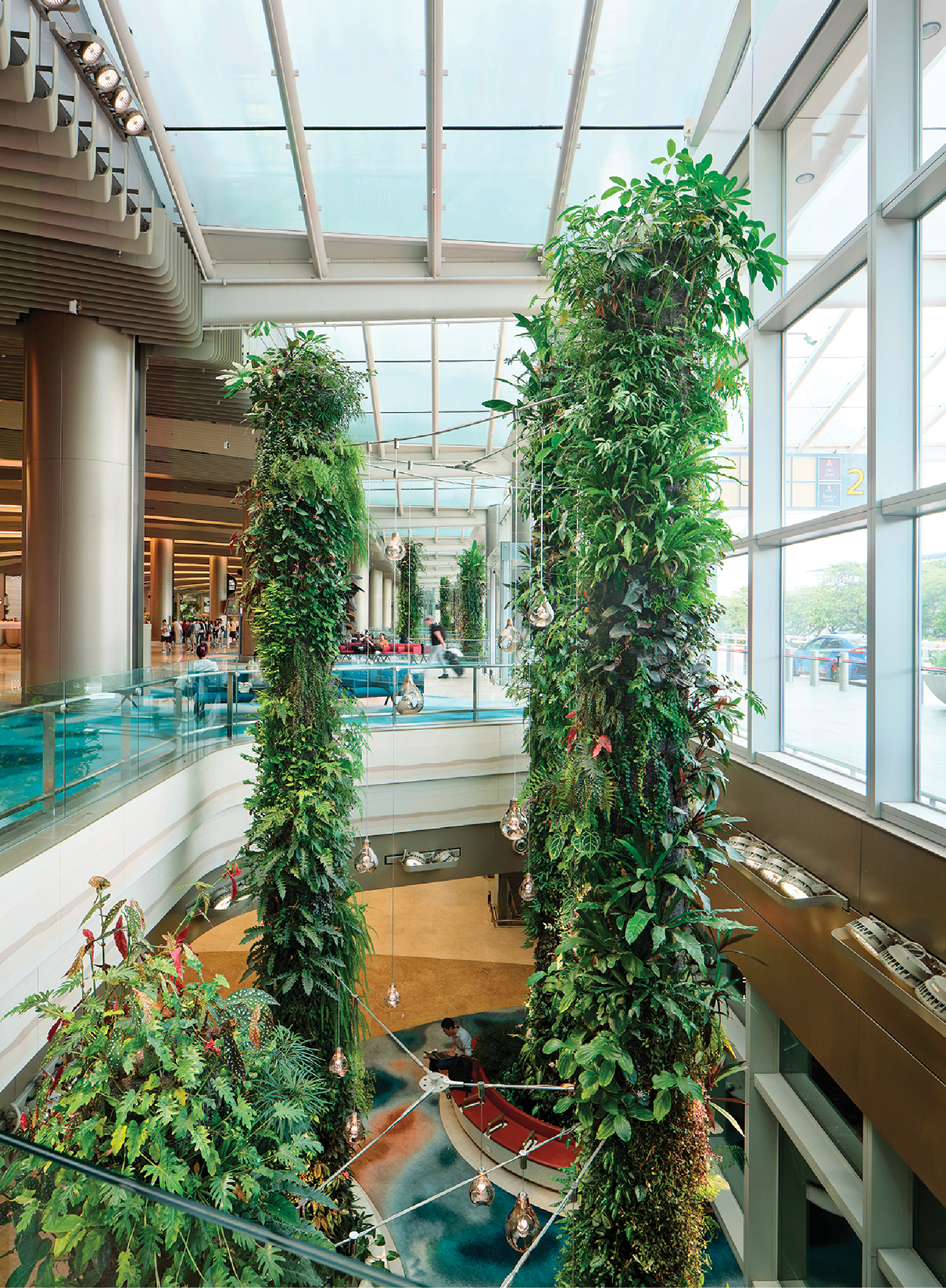 A large atrium with a lot of plants