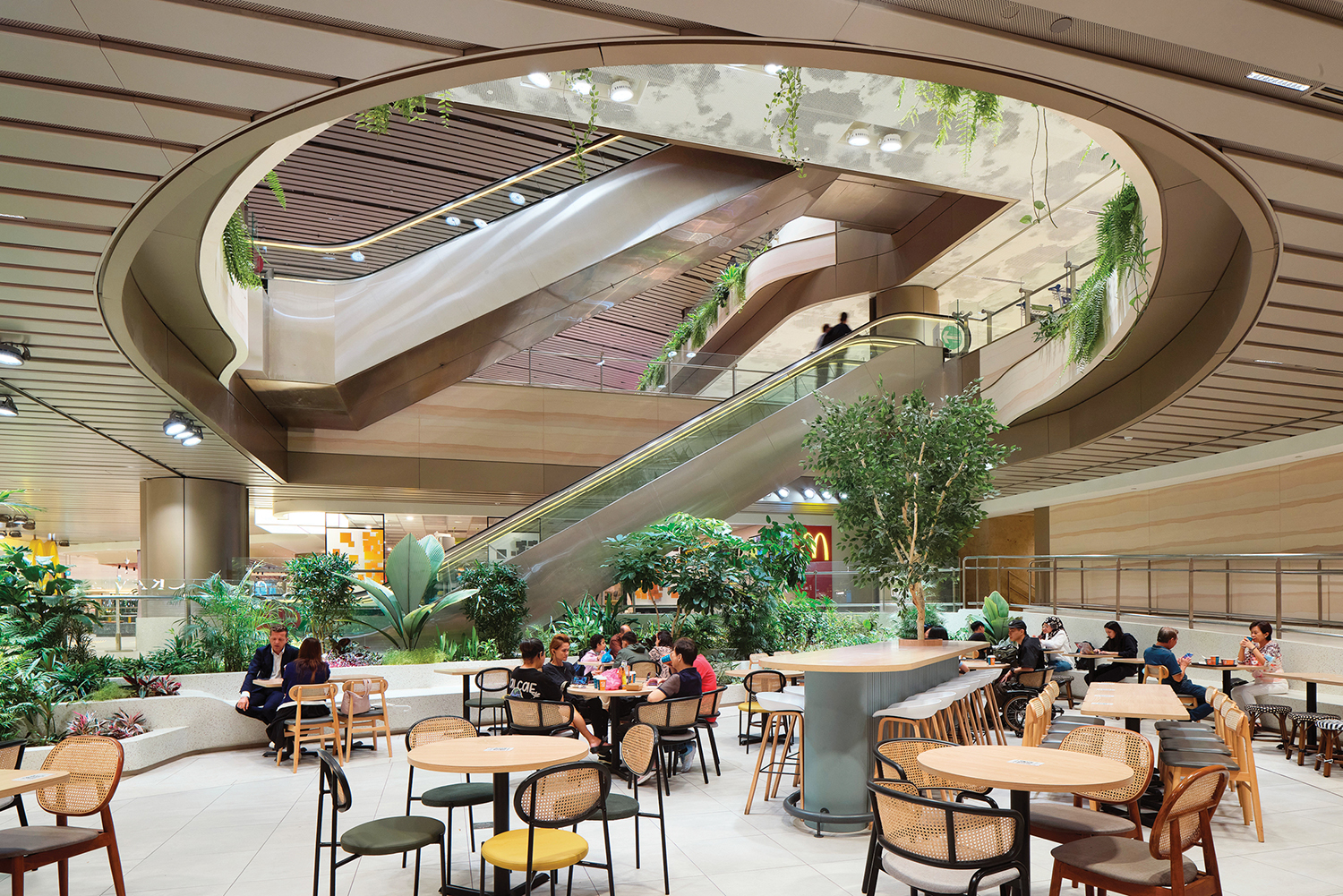 A restaurant with a spiral staircase and a spiral staircase