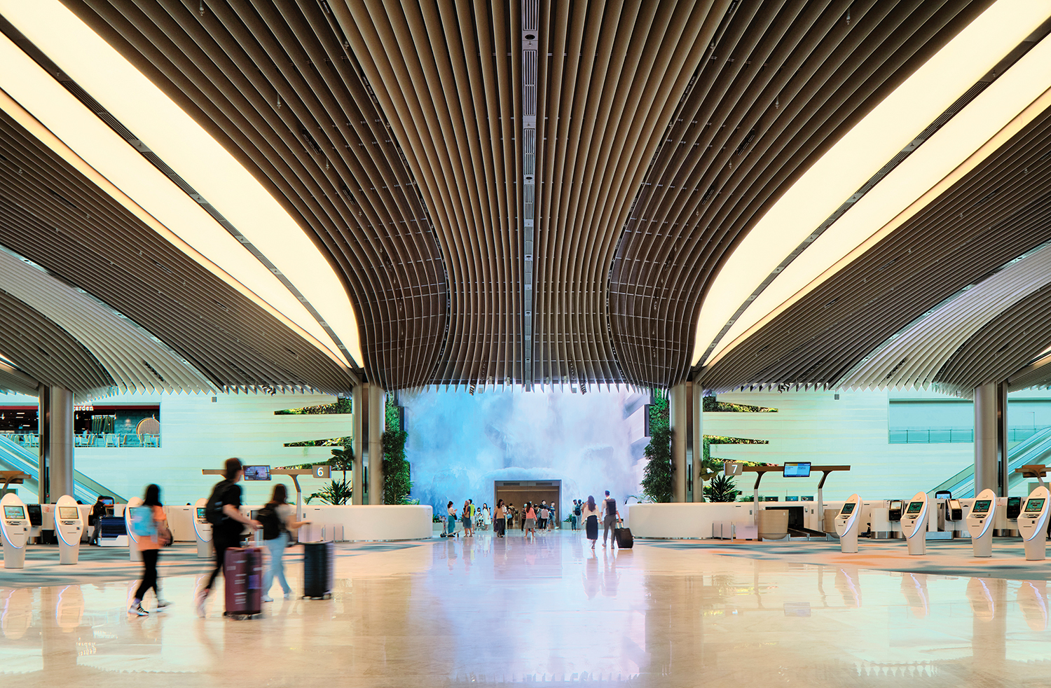 A large lobby with a waterfall of water