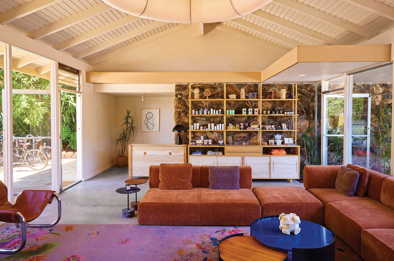 A living room with a couch and a bar