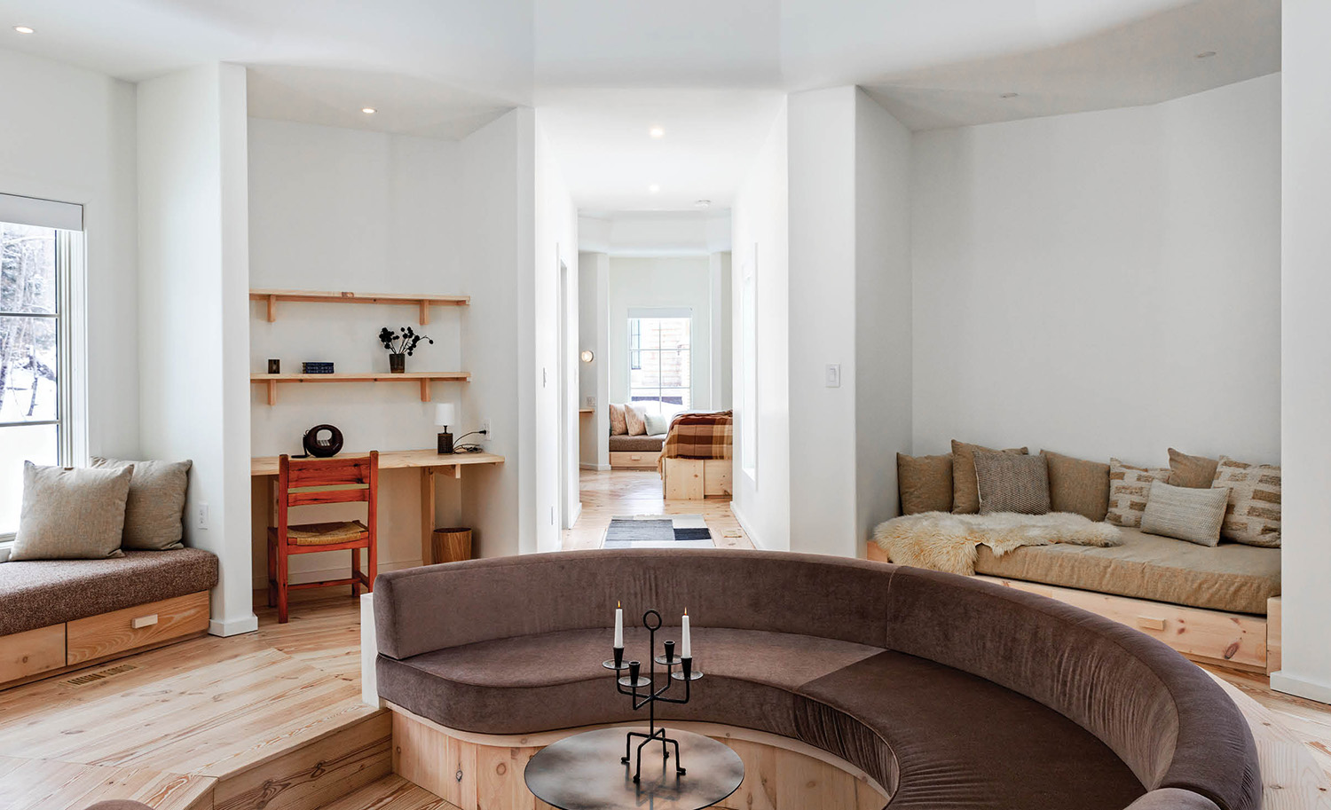 A living room with a couch and a table