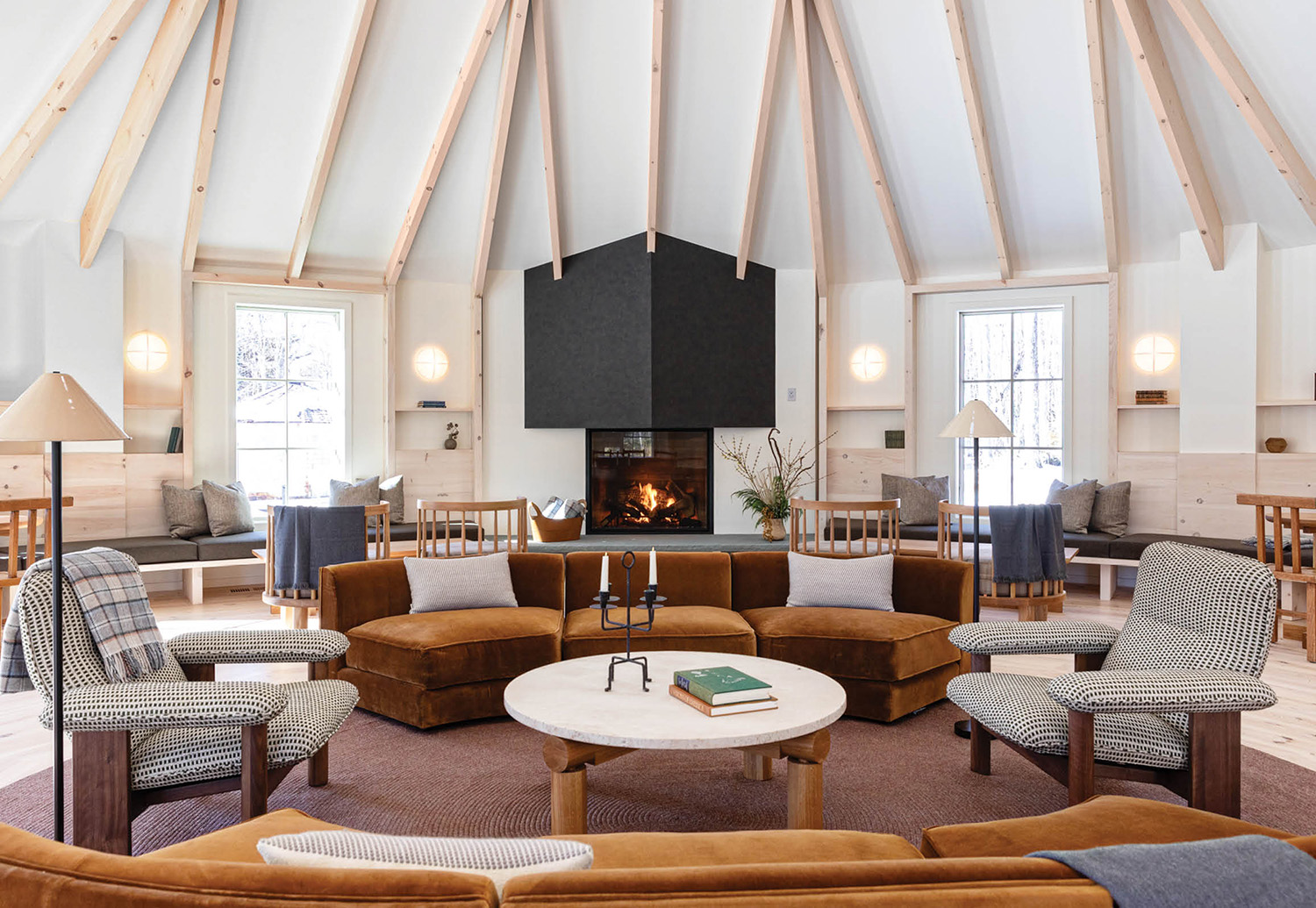 A living room with a fireplace and a couch