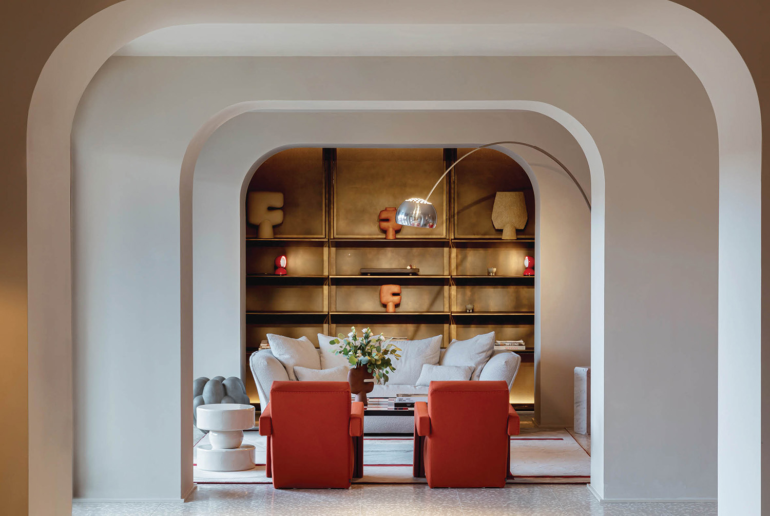 A living room with a couch and a table