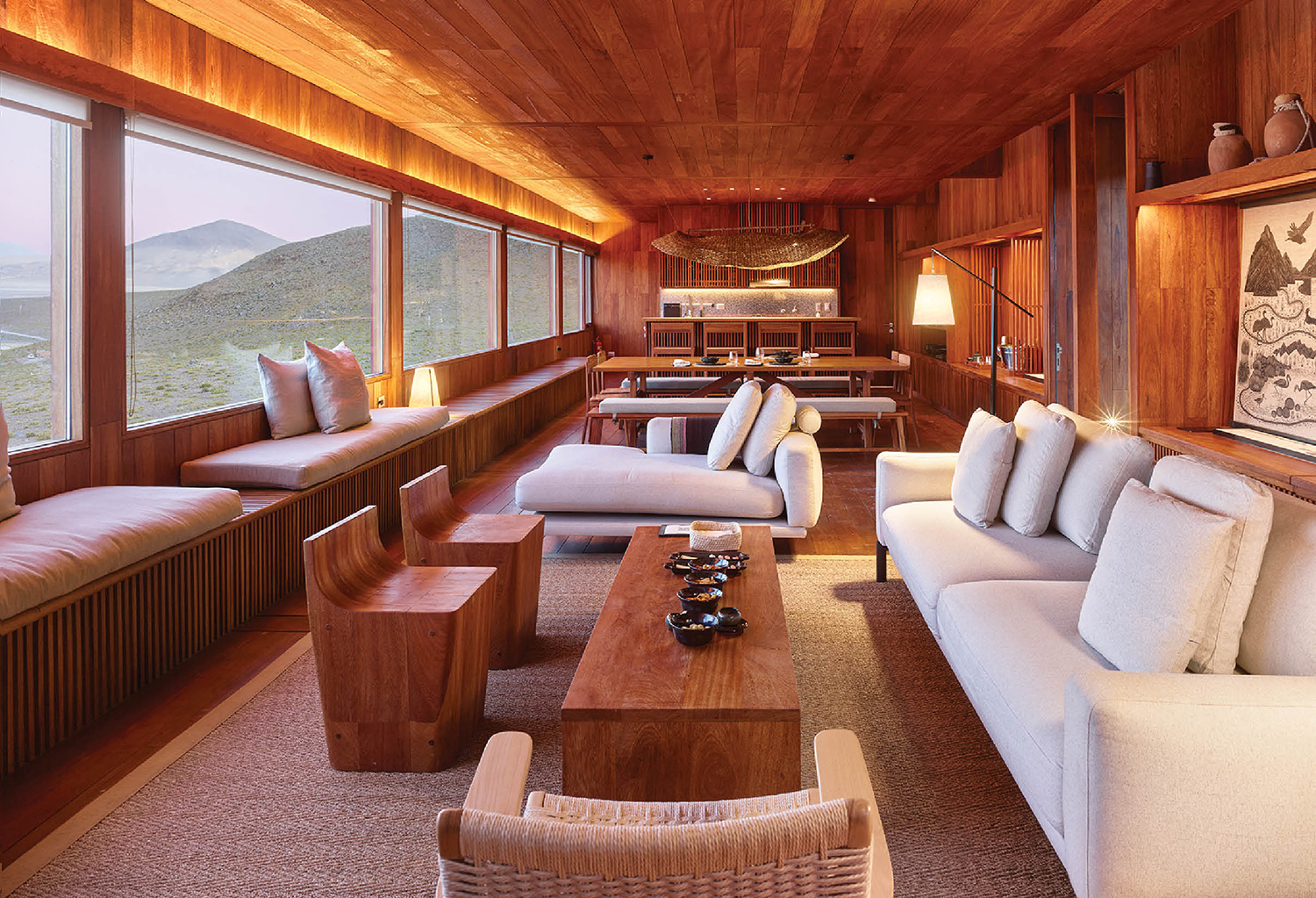 A living room with a couch and a table