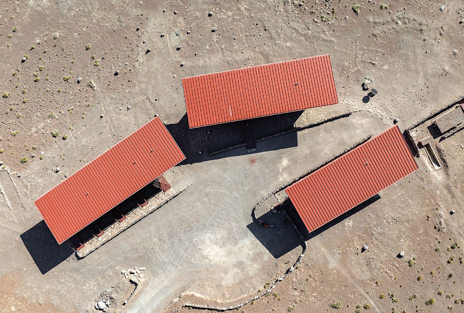 A group of red roofing structures