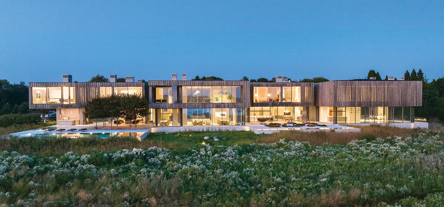 exterior facade of home surrounded by greenery