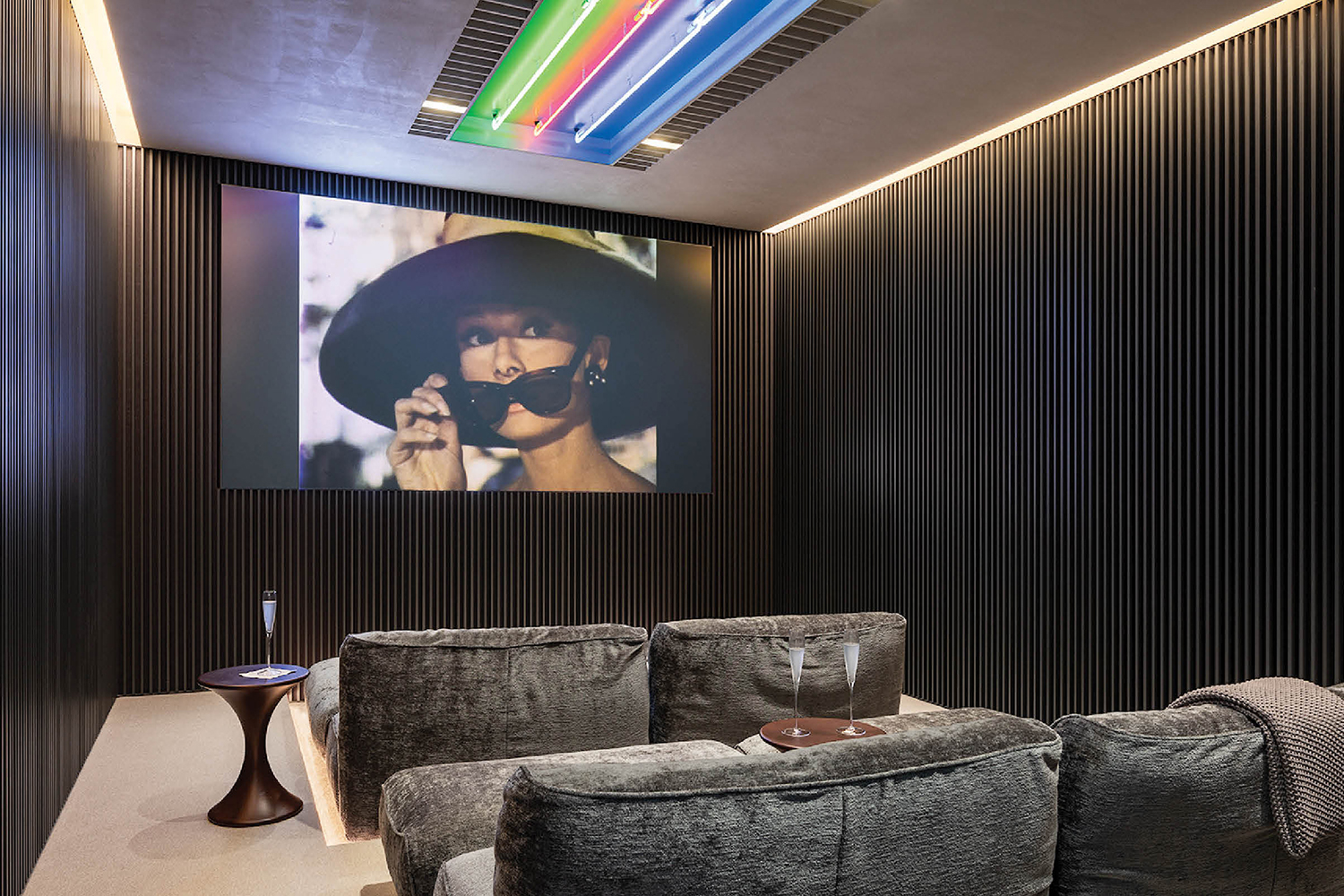 home theatre with large projector screen and seating