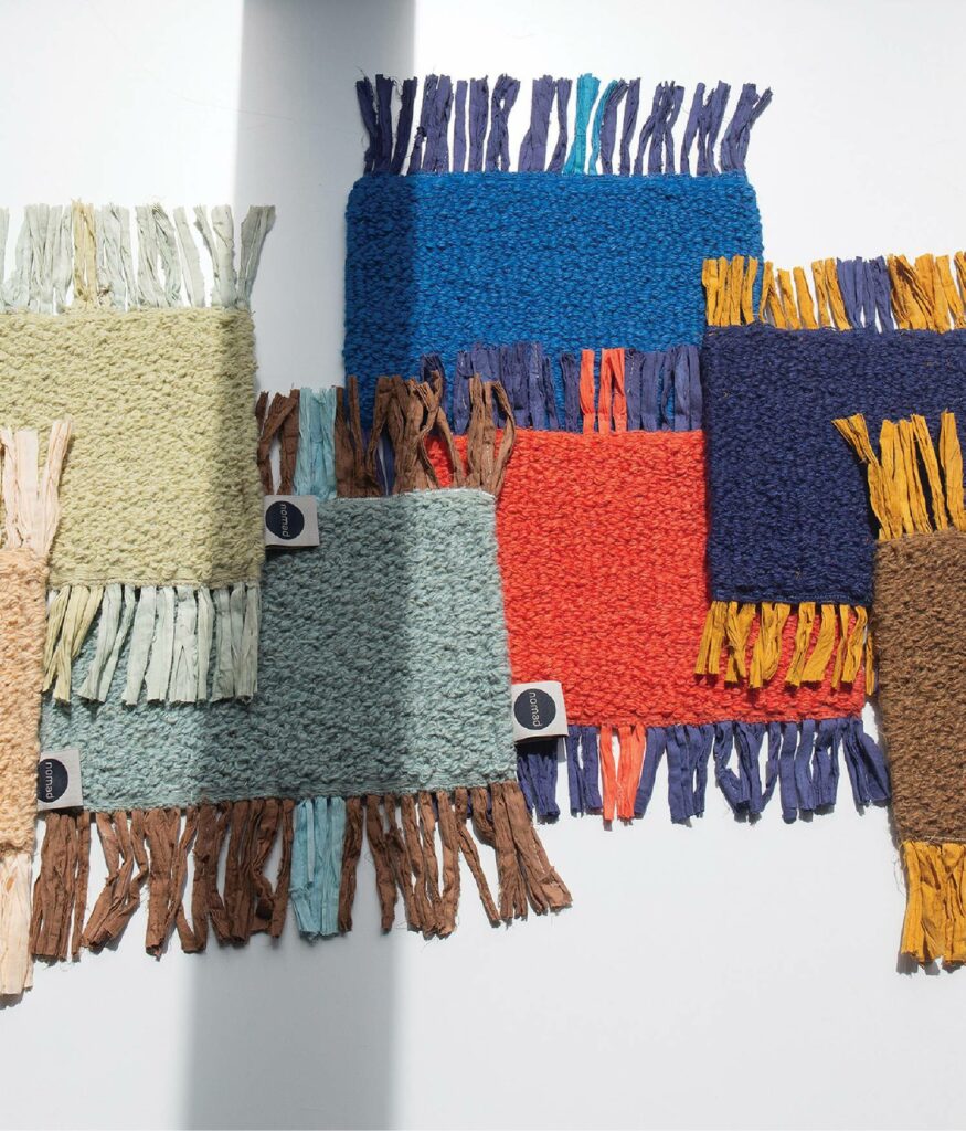 a group of colorful woven pieces