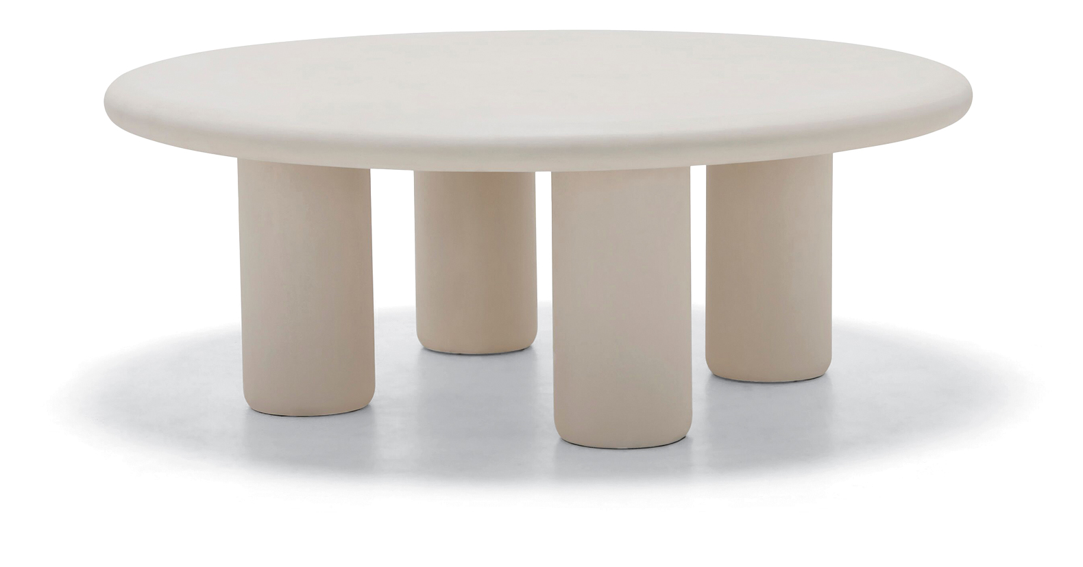 a white table with three legs and a round top