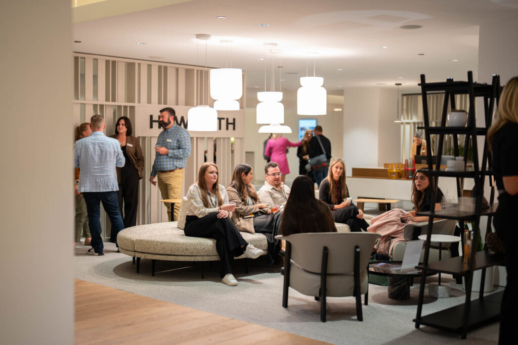 designers talk in a showroom