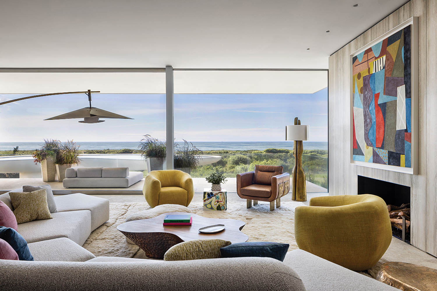 the living room of a beach house with views of the ocean