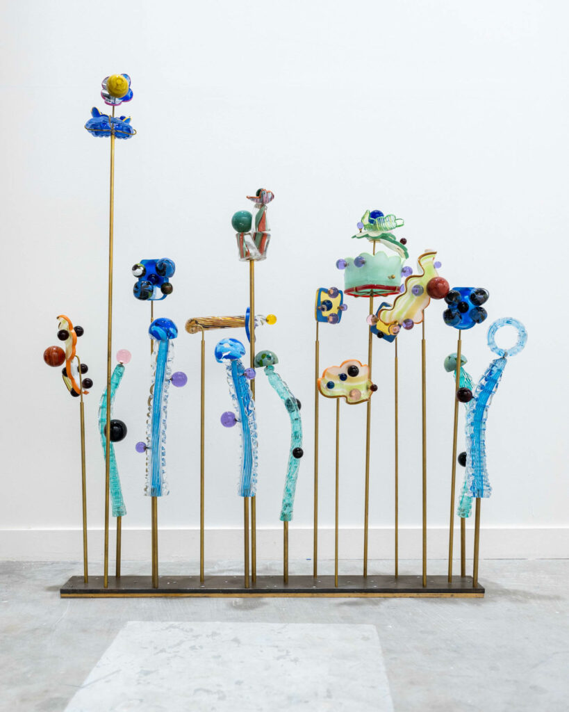 a room divider that looks like a whimsical garden