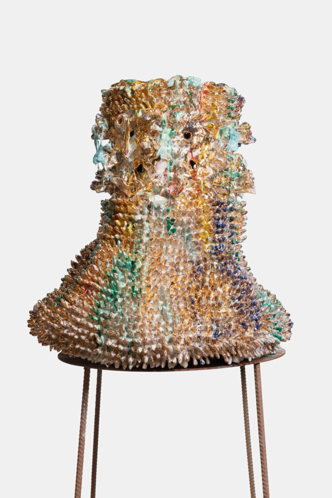 a glass bell shaped sculpture