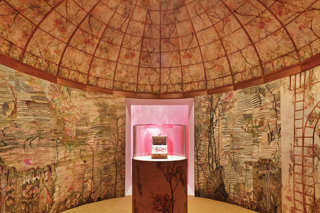 domed room with miss dior perfume on a pedestal