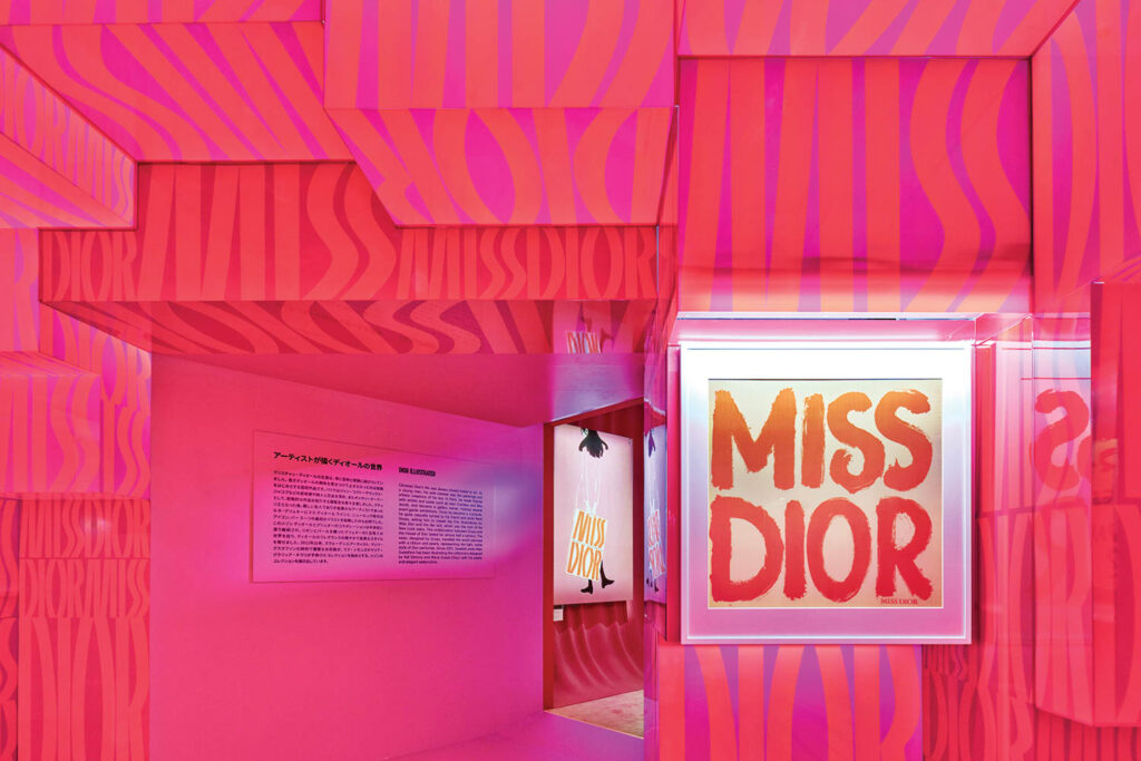 pink wall with miss dior written on it