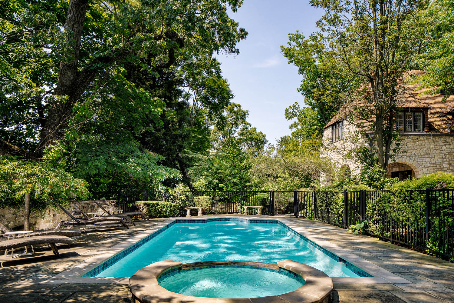 expansive pool surrounded by trees