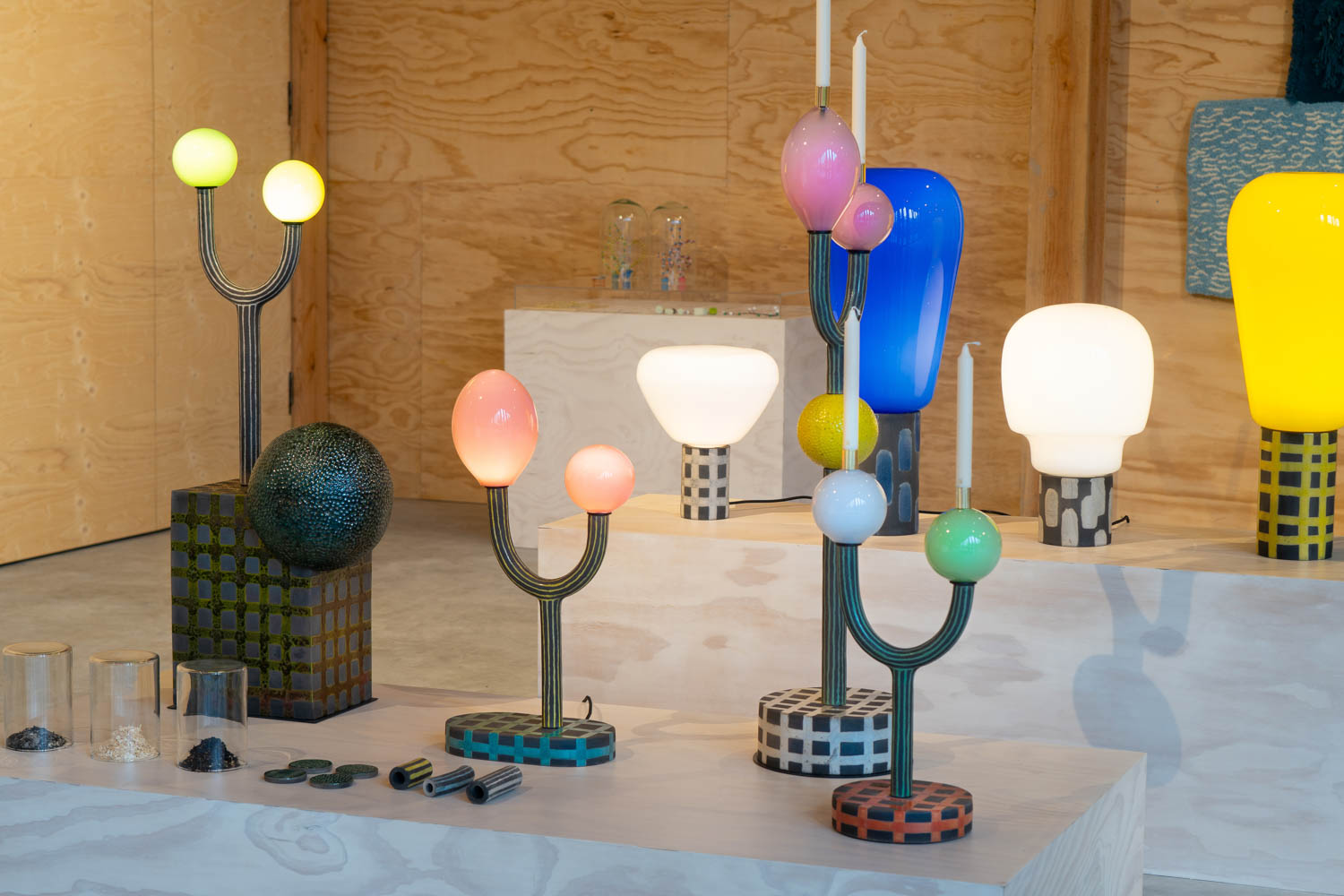 white marble table with multiple different colored lights on a stand