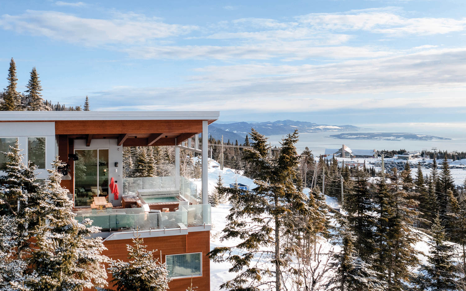 exterior facade of ski chalet with view of the snowy mountains