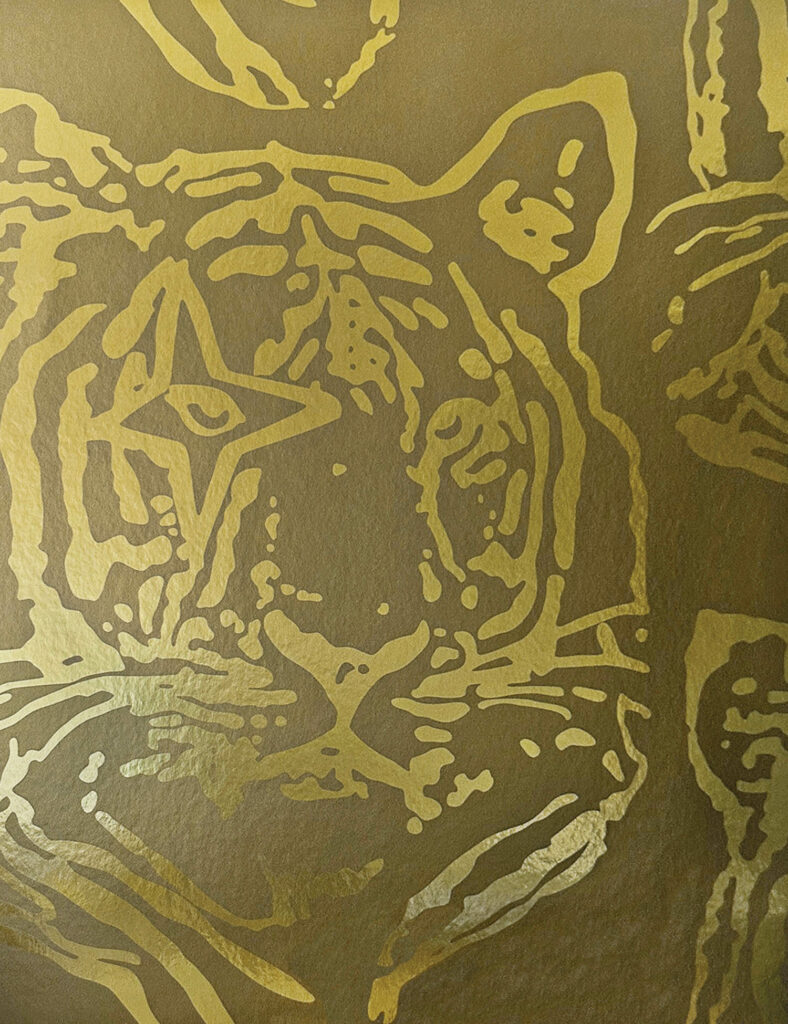 olive green wallcovering with a tiger face