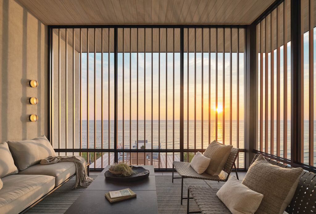 screened porch with aluminum slatters and stretch chairs