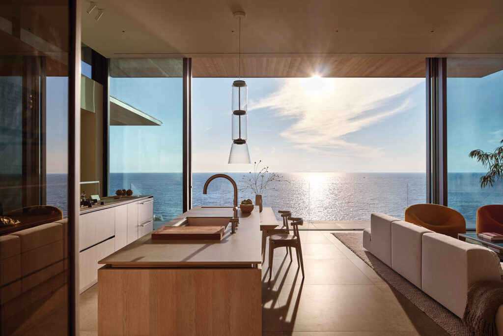 kitchen with glass windows and views of the ocean