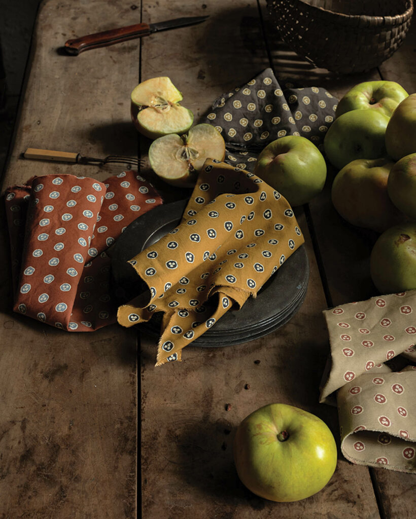 multiple assortment of items on a long wooden table