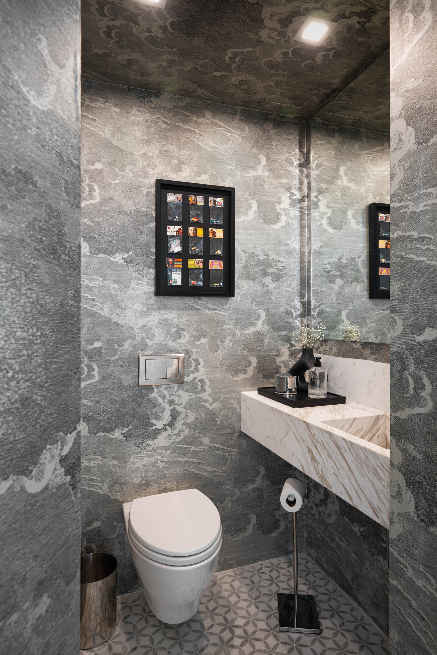 powder room made of all grey marble white white toilet and vanity