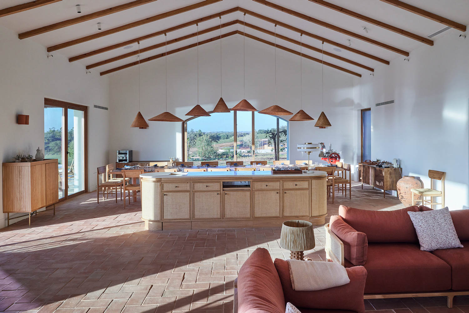 living area of Casa Nossa with island and pointed ceilings